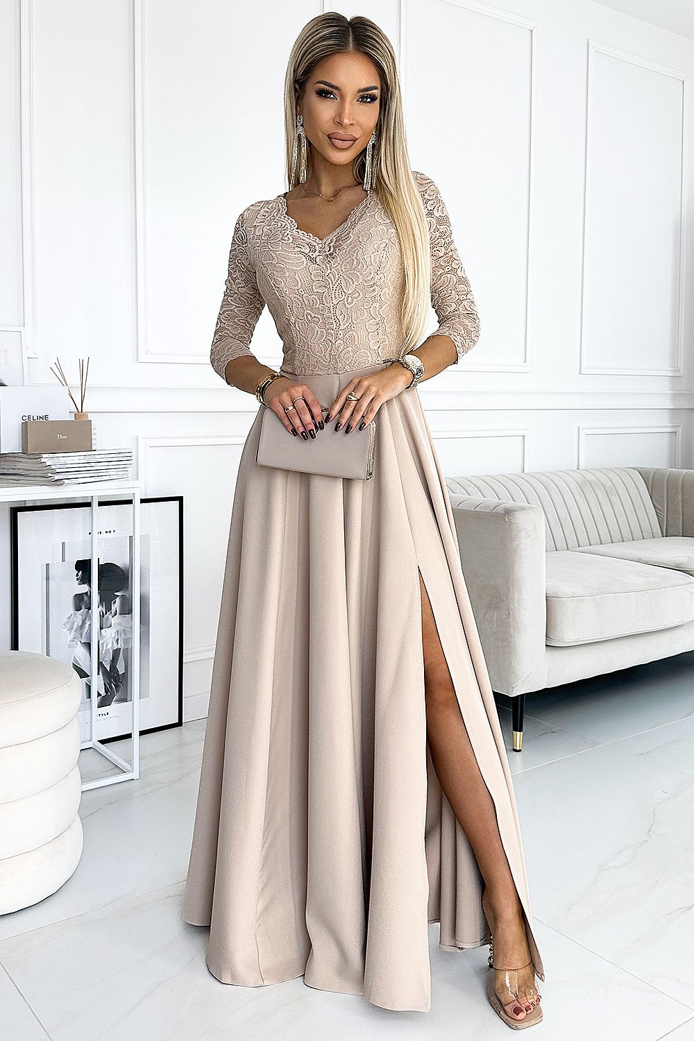 Model draagt ivoren Numoco jurk op bruiloft – Elegante outfit voor speciale gelegenheden