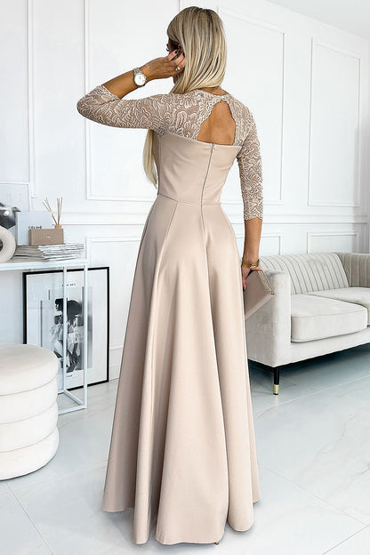 Model draagt ivoren Numoco jurk op bruiloft – Elegante outfit voor speciale gelegenheden