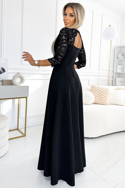 Model draagt ivoren Numoco jurk op bruiloft – Elegante outfit voor speciale gelegenheden
